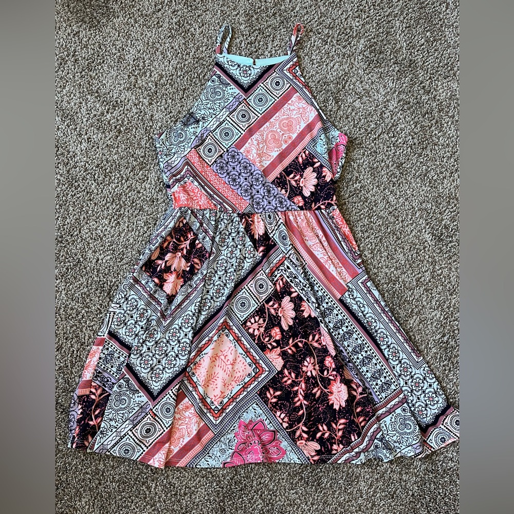 Maurice’s high neck dress.